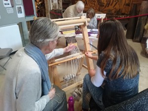 Teaching a visitor weaving on a warp-weighted loom